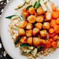 Scallop Hibachi · Grilled to perfection in our tasty homemade teriyaki sauce. Served over a bed of fried rice ...