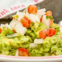 Guacamole · Chunky avocado, onion, cilantro, jalapeño, lime served with corn chips