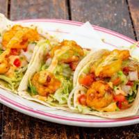 Baja Tacos · Three tacos with grilled or fried shrimp or fish, cabbage slaw, chipotle mayo, avocado, pico...