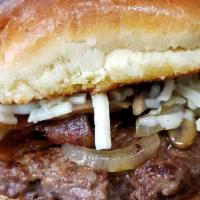 Mushroom Onion Burger · Grilled mushrooms, onions and melted white American Swiss cheese ontop. Add bacon for an add...
