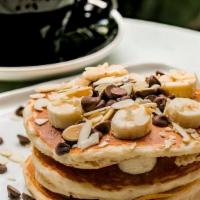 Chocolate Chip Pancake · Sliced banana and almonds, drizzled with maple syrup.  Substitute Pancake for an additional ...