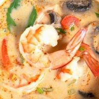 Tom Yum “Lemongrass Soup” · Thai classic spicy lemongrass soup and mushrooms topped with cilantro and green onions.