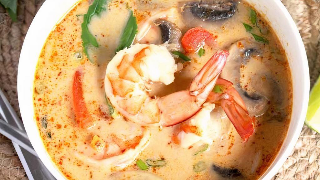 Tom Yum “Lemongrass Soup” · Thai classic spicy lemongrass soup and mushrooms topped with cilantro and green onions.