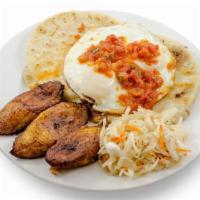 Pupusas A Caballo · 2 pupusas of your choice topped with 2 fried eggs + homemade tomato sauce + cabbage salad + ...