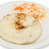 Pupusas · Pupusas is the traditional dish of El Salvador. Handmade corn tortilla filled with you favor...