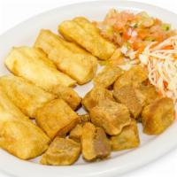 Cassava With Fried Pork Belly · Boiled or Fried cassava + fried pork belly + cabbage salad + pico de gallo
