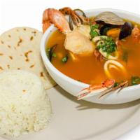 Large Salvadorian Seafood Soup · Made to order. Seafood soup made with: fish + calamari + green mussel + black mussel + clam ...