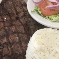 Churrasco De Vacio (Flap Meat Steak) · Grilled flap meat steak served with 2 side orders and 1 tortilla.