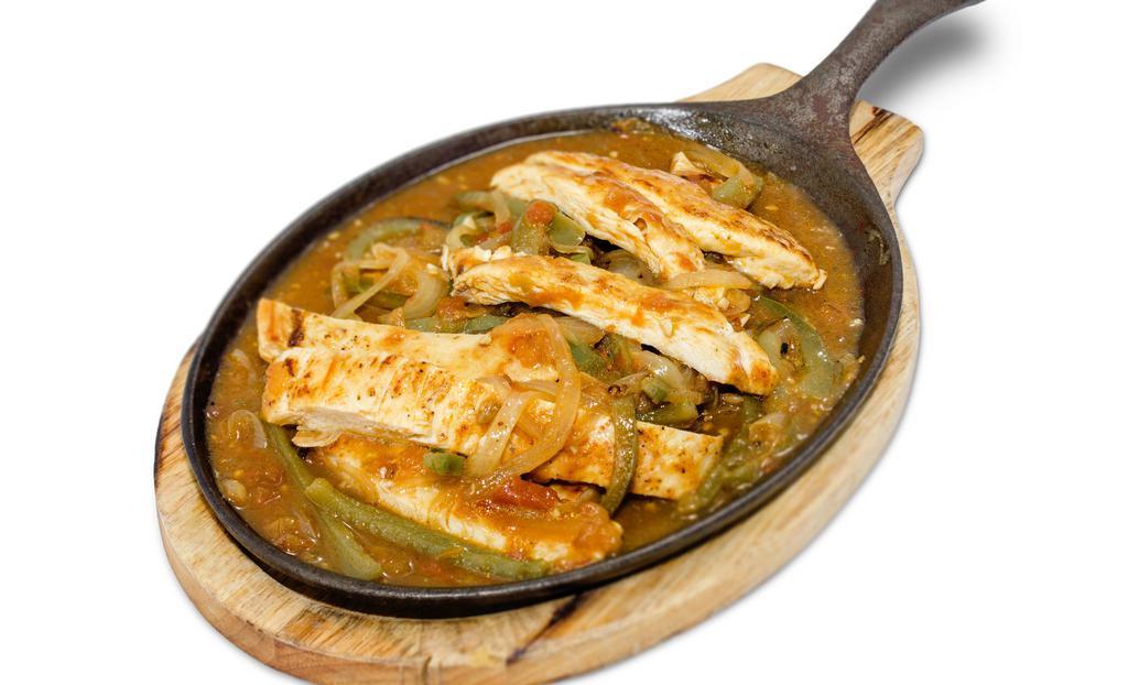 Chicken Fajitas · stripes of grilled chicken breast, sauteed with tomatoes, green bell peppers and onions. Served with 2 side orders and 1 tortilla.