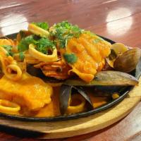 Frutos Del Mar · Mix of seafood (,mussels, clam, shrimp,calamari, fish) cooked  with our house tomato sauce. ...