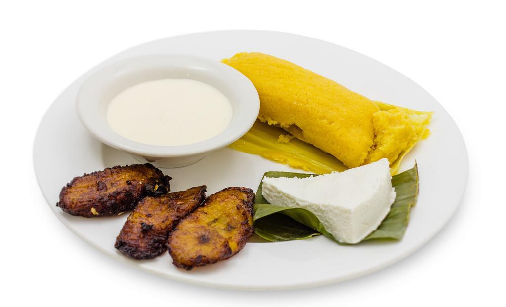 Corn Tamale Platter · 1 sweet corn tamale, cream, cuajada (fresh cheese), and fried plantains.