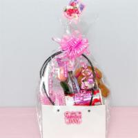 Bag Of Love Basket · A beautiful Pink Bow Basket, with a perfume, sweet tootsie roll,  & a nice set of pen.  An e...