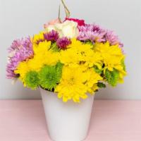 Mellow Yellow · A  full bouquet with Yellow Daisies , Purple Pompon  , Mums, Red. White and Pink Roses. A be...