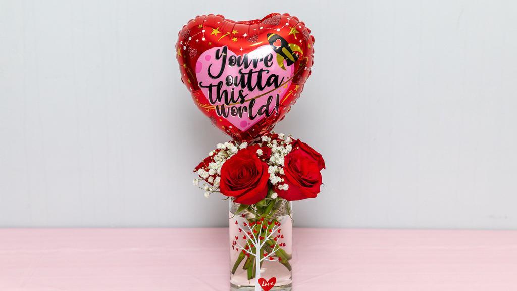 Out Of This World  · 6 Red Roses and a Balloon on a Stick .  Sure to bring that smile on any face.