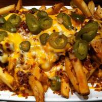 Jalapeno Pepper Fries · Fries covered in cheddar cheese sauce, bacon, ranch, shredded cheddar, jalapenos and jalapen...