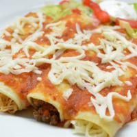 Enchiladas Supremas · Supreme combination consisting of one chicken, one bean, one cheese and one beef enchilada t...