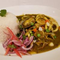 Seco De Mariscos · Seafood stew in cilantro base, potatoes, salsa criolla and jasmine rice.