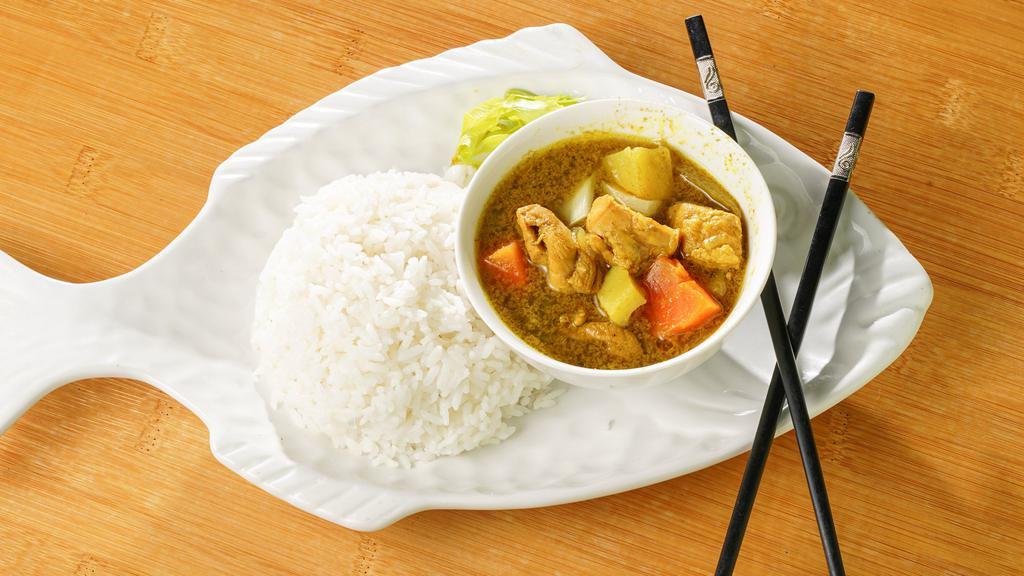 Curry Chicken · Hot and Spicy. A common southeast Asian and Caribbean dish. Come with the white rice and two vegetable sides. Hot and spicy.