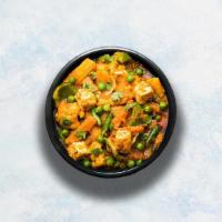 Vegetable Curry · An assortment of farm-fresh vegetables braised in a mild velvety yogurt gravy seasoned with ...