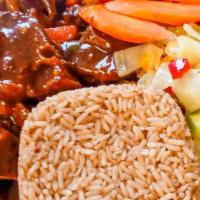 Braised Oxtails · Served with Rice and Peas and Cabbage