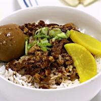 Braised Pork Rice 卤肉饭 · Selected pork belly cooked with our special recipe over steamed rice or pasta, served with m...