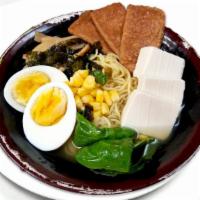 Veggie Tofu Miso Ramen 日式素豆腐拉面 · Fried tofu sheet, tofu, spinach, sweet corn, bamboo shoots, shredded seaweed and egg in a mi...