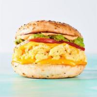 Spicy Avocadaddy · Egg, cheddar cheese, mashed avocado, sliced tomato, and spicy aioli on a toasted everything ...
