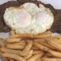 Bistec A Caballo / Horse Style Steak · Filete servido con dos huevos y arroz. / Steak served with two eggs and rice