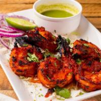 Tandoori Shrimp Ajwain · Perfectly marinated with chef's special spices and tandoori grilled shrimps.