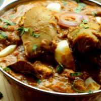 Chicken Mughlai - Served With Basmati Rice · Pieces of chicken in a delicious creamy gravy with egg and coriander.  - Served with Basmati...