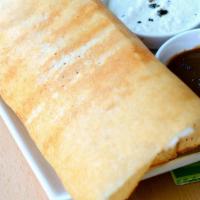 Masala Dosa (Chef'S Special) · Savory crepe filled with mildly spiced mashed potatoes.