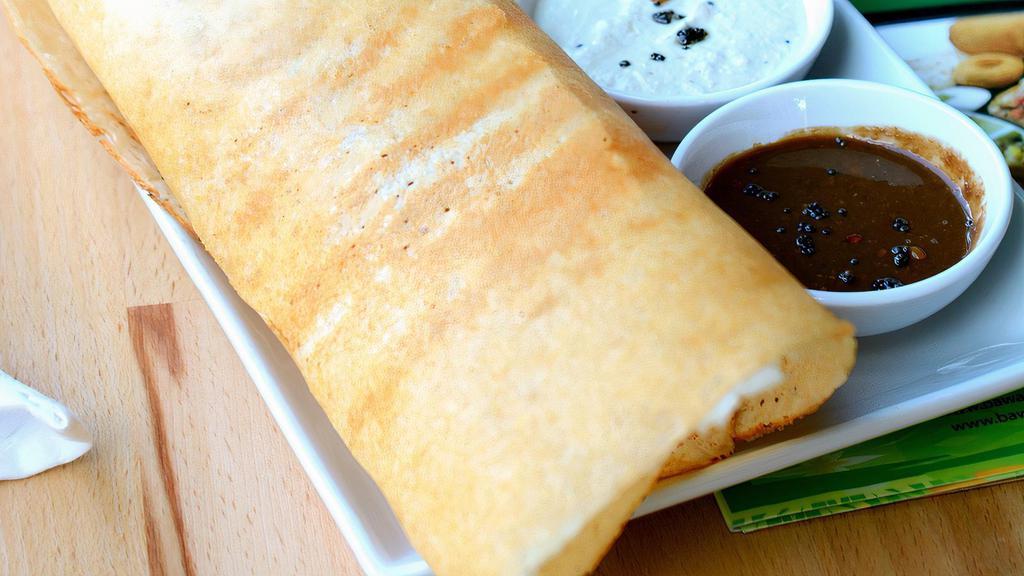 Masala Dosa (Chef'S Special) · Savory crepe filled with mildly spiced mashed potatoes.