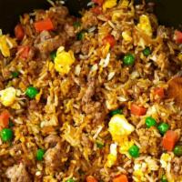 Roast Pork Fried Rice · Stir fried rice with mild sweet meat that has been roasted.