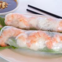 Fresh Summer Rolls (2 Pcs) · Rice paper wrapped in rice noodles, lettuce, mint, and beansprouts.