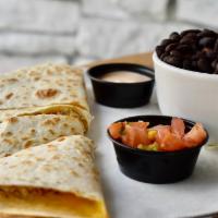 Quesadilla De Traditional · A blend of Mexican cheeses. Served with chipotle sour cream, pico de gallo, and a choice of ...