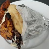 Pabellon · Shredded beet. Black beans. Fried sweet plantains and white cheese.