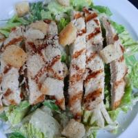 Caesar Salad With Chicken · Romaine lettuce, classic Caesar dressing, croutons and Parmesan cheese with chicken.