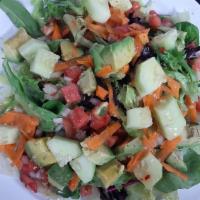 Ensalada De La Casa. · House salad with mix green lettuce. Tomato, onion. Cucumber, carrots and avocado side.