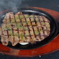 Churrasco · Grilled NY steak. Served with with white rice, salad and French fries.