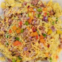 Anytime Breakfast Potato · Warm fluffy potato filled with scrambled egg, bacon, Cheddar cheese, bell pepper, and onions.