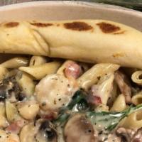 Fredo Is Twisted · Gulf shrimp, bacon, spinach, mushrooms, and alfredo sauce.