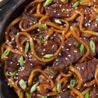 Shanghai Beef · Tender fillet tips in a savory sauce, bell peppers, and onions with Jasmin rice.