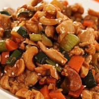 Cashew Chicken · All-natural chicken breast stir-fried with veggies and cashews in a soy-based sauce with Jas...