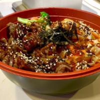 Cumin Beef Bowl · Roasted seasoned beef with boiled broccoli, carrots and teriyaki sauce.