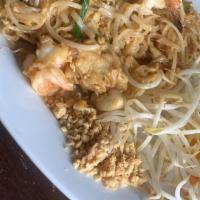 Pad Thai · Sauteed rice noodles, eggs, shrimp, chicken, green onions, bean sprouts and crushed peanut.