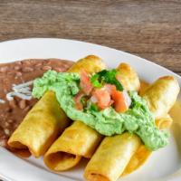 
Chicken Flautas · Three flour tortillas stuffed with chicken and deep fried. Topped with homemade avocado crem...