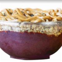 Naked Bowl · Organic acai with banana. Topped with granola and peanut butter.