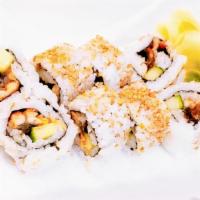 Eel Cucumber Roll · Eel and Cucumber topped with Sesame Seed. Comes with Eel sauce on side.