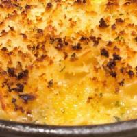 Iron Skillet Mac And Cheese · creamy cheese sauce, cheddar, gruyère crust