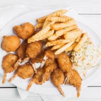 Twelve Piece Shrimp Dinner · Comes with fries, slaw, & hush puppies.